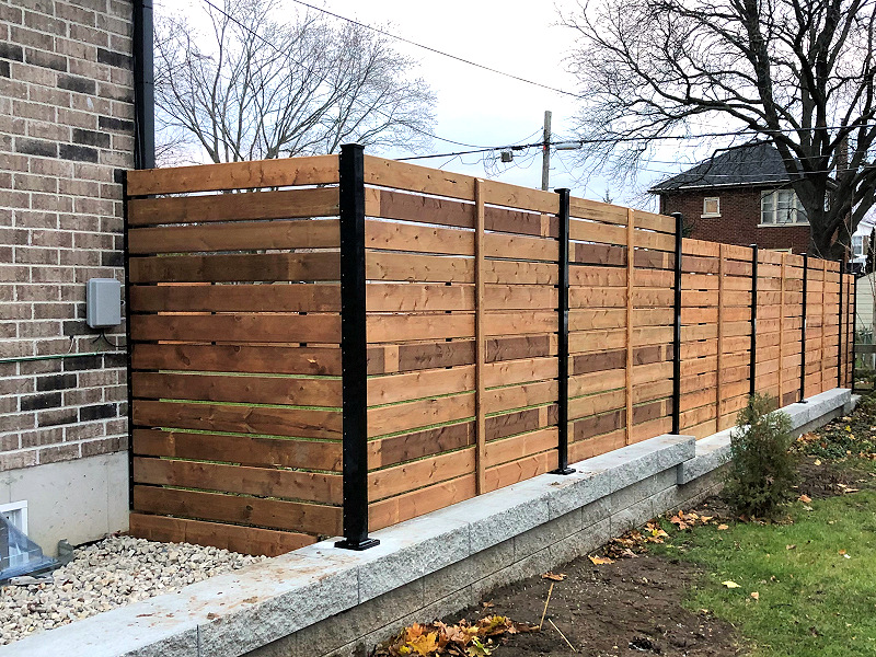 Pressure treated wooden fence